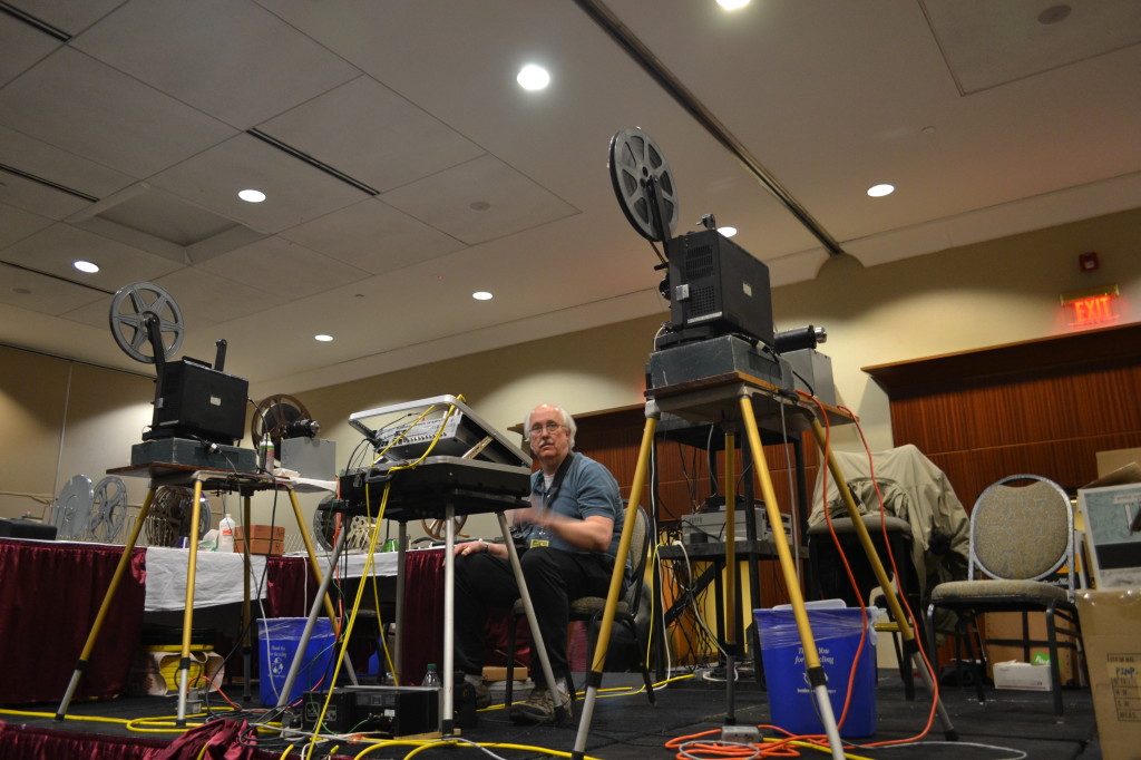 Projectionist Bob Hodge enjoys some downtime between the shows.
