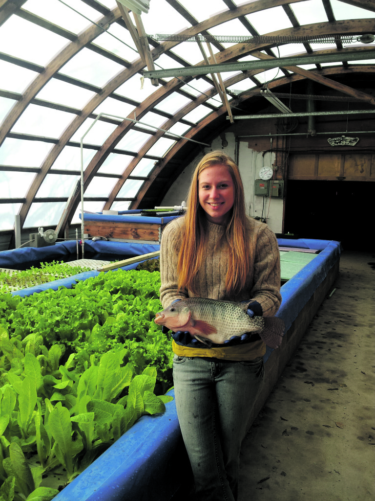 Jamie holding a tilapia. 