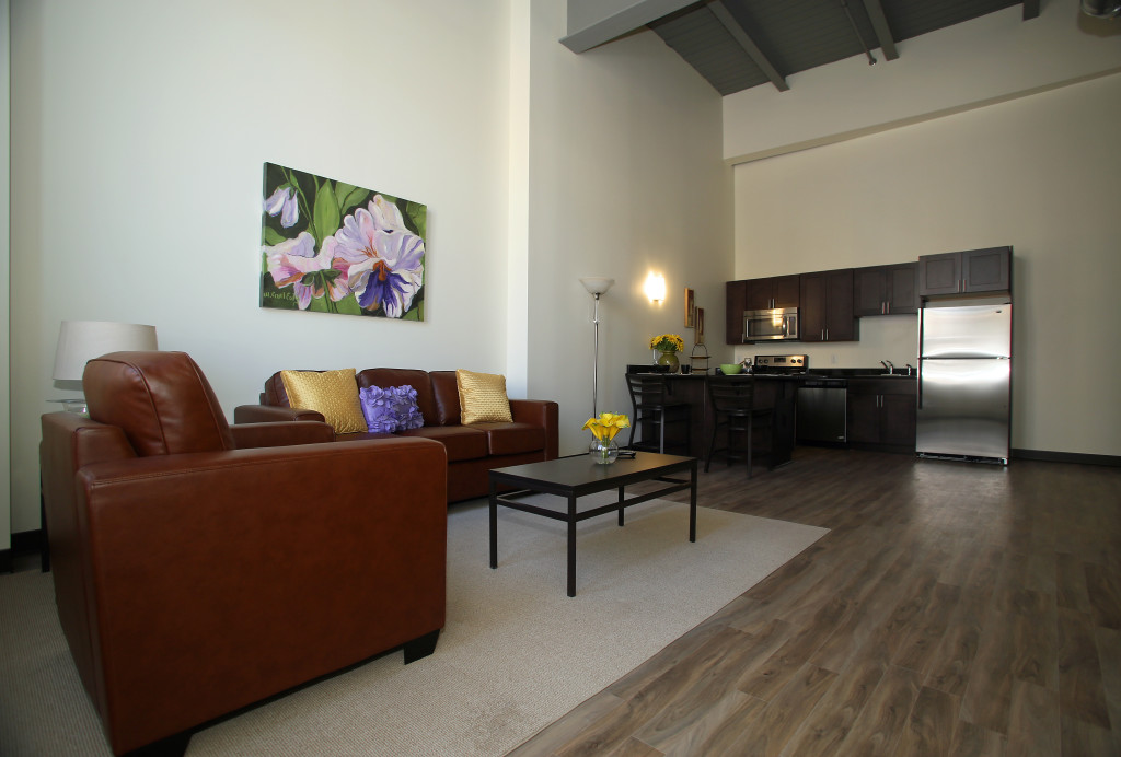 The apartments at Creekwalk Commons are furnished with leather furniture and the kitchens have stainless steel appliances.  Photo by Gloria Wright | Syracuse New Times