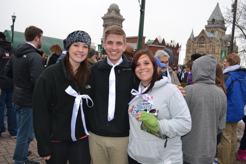 Stephanie Gushlaw, Josiah Henry and Emily George from Gold Sail Consulting showing their support for the White Ribbon Campaign. 