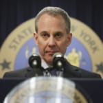 Former NY attorney general Eric Schneiderman stands behind a podium.